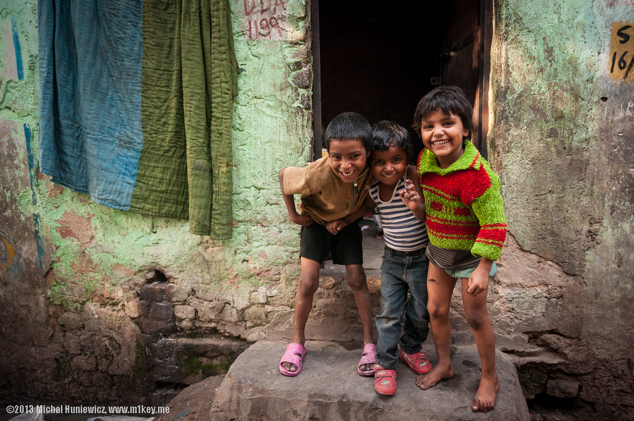 Children smiling in a slum